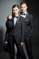 couple in strict suits