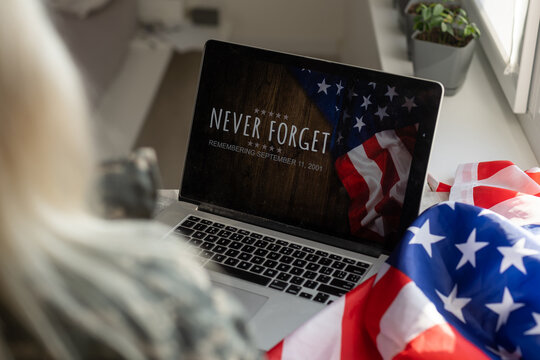 Writing note showing Veterans Day. Business photo showcasing a public holiday to honour US veterans and victims of all wars woman with laptop smartphone and office supplies technology.
