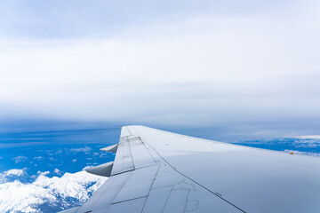 Airplane wing over Seattle Mountains, United States of America