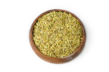 Dried fennel seeds on the white background