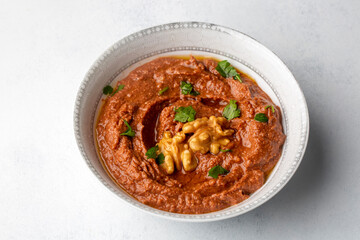 Traditional delicious Turkish appetizer, Muhammara, healthy walnut and roasted red bell pepper dip.
