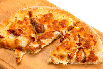 Food concepts. Upper Closeup View of Traditional Freshly Baked Cheese and Mushrooms Pizza On Woden Plate.