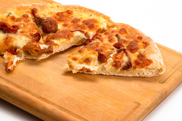 Closeup View of Sliced Traditional Freshly Baked Cheese and Mushrooms Pizza On Woden Plate. Food Concepts.