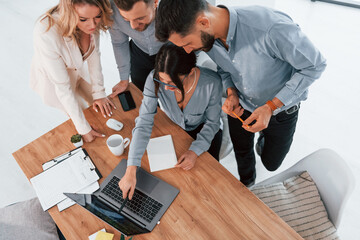 Top view of business people that working by using laptop