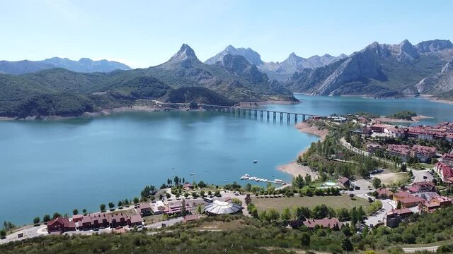 aerial cinematic footage of the lake and the mountains of Ria&ntilde;o in Leon (Spain)