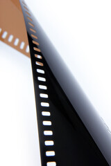 Old 35 mm film strip on a white background