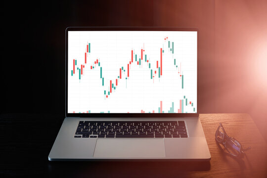 Analysis of financial charts of the stock market. Trader trading on stock quotes