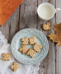 Autumn cookies on wooden table.