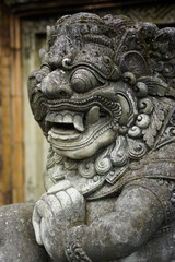 Fototapeta na wymiar Close up view of the ornate statue (guard statue) at Ubud Palace, Bali.