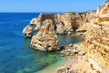 Fototapeta na wymiar Scenic landscape of Praia da Marinha beach and cliffs in Algarve