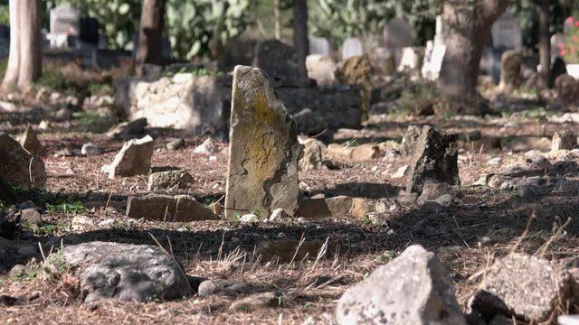 Old Muslim graveyard close up. Old islamic cemetery.