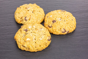 rolled oats chocolate chip peanut butter cookie with pretzel sticks