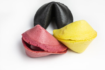 crispy fortune cookies in three different colors - 482414094