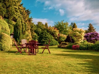 English Autumn Garden with Teak Furniture 