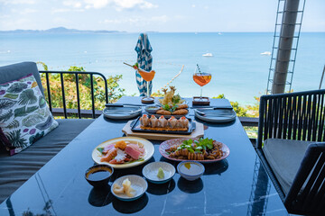 a beach cafe in Pattaya Thailand, luxury lunch dinner at the beach in a cafe in Pattaya Thailand. 