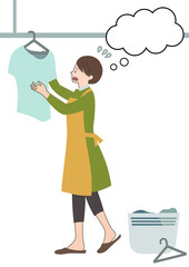 エプロンをして困った顔で洗濯物を干す女性（吹き出し付き・ワンオペ家事等のイメージに）