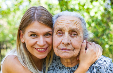 Hugging grandma in the park