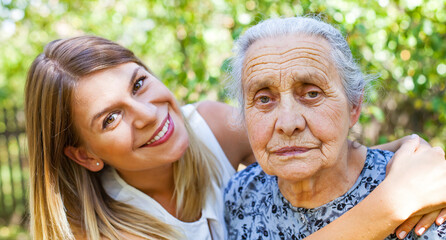 Hugging grandma in the park