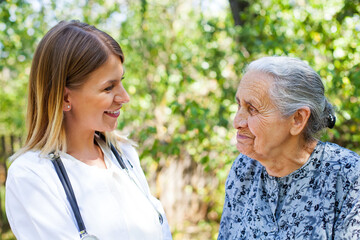 Elderly female with kind phyisician