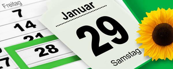 Kalender 28. und 29. Januar 2022 Freitag und Samstag mit Sonnenblume auf grünem Hintergrund