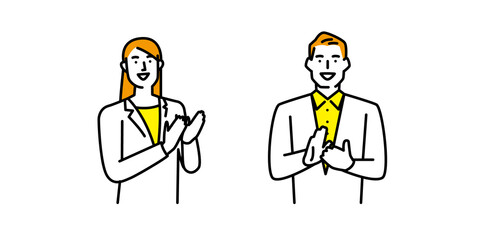 拍手して喜ぶ男性と女性