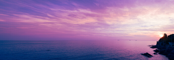 Coast of Liguria. Mediterranean Sea at sunset, Italy. Sea panorama extra wide - 482421022