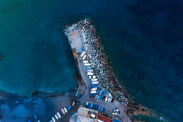 Beach on the Mediterranean coast. Italy. Pier aerial view. - 482421028