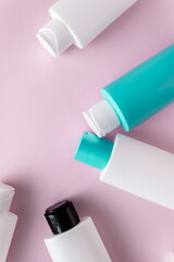 Cosmetics for body care, in plastic bottles, flat lay,top view