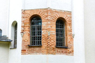 Fototapeta na wymiar Ancient brickwork on the wall of St. Sophia Cathedral in Veliky Novgorod