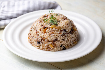 Traditional delicious Turkish food; rice pilaf with pine nuts and currants (Turkish name; ic pilav or pilaf)