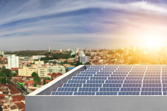 Horizon landmark ecological energy renewable solar panel plant. Photovoltaic solar energy with skyline city background.