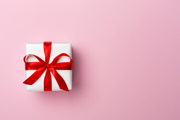 Top view of gift box on color background