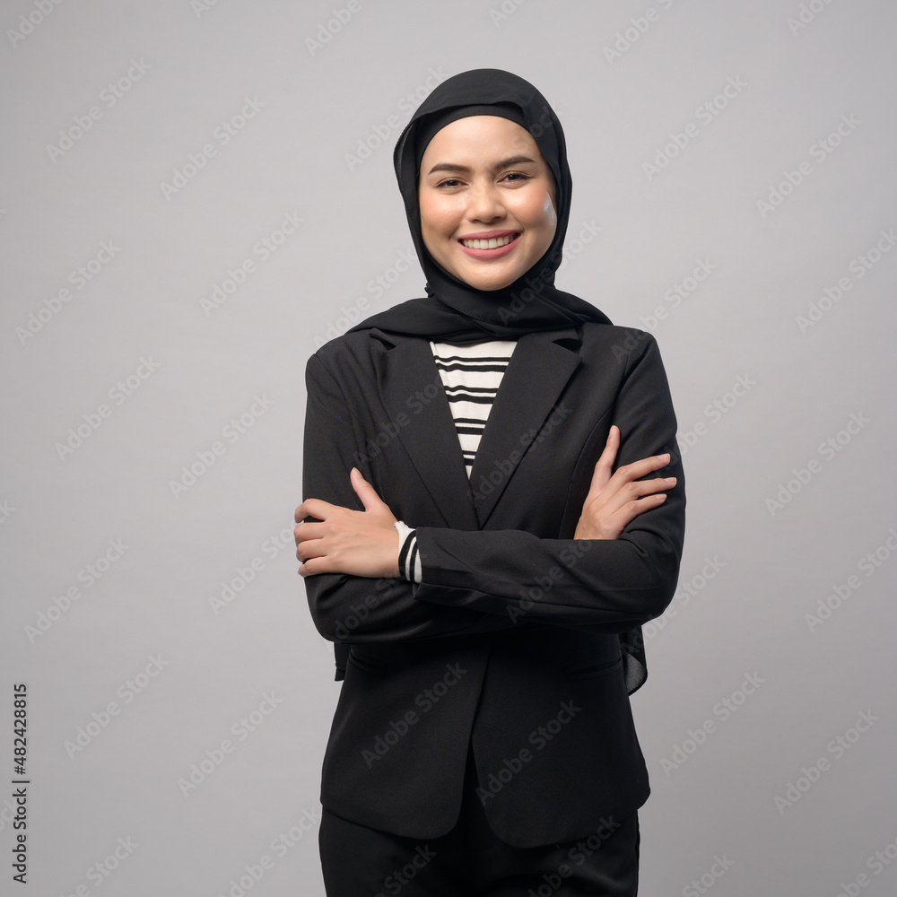 Wall mural beautiful business woman with hijab portrait on white background