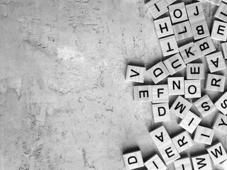 Top view of wooden letters. Black and white photography.