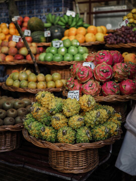 Farmers' markets full of colorful tropical fruits, vegetables and spices in Funchal on the island of Madeira, Mercado dos Lavradores