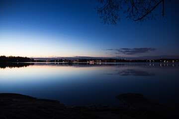 Night sky on a lake blue hour