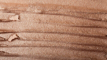 Macro photography of the cosmetic highlighter with shimmer.