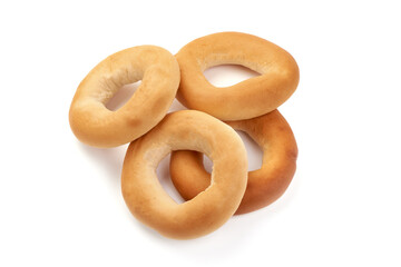 Freshly baked bagels, isolated on white background.