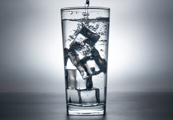 The image of pouring drinking water