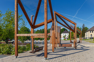 Fototapeta na wymiar Modern wooden installations on the city main square. Polva, Estonia.