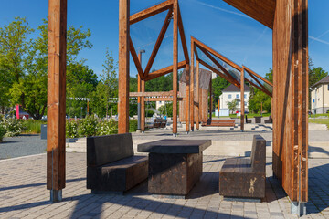Modern wooden installations on the city main square. Polva, Estonia.