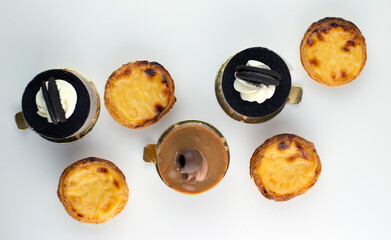 Baked round sweets top view on white background