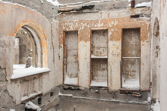 Old railway station at winter with painted walls