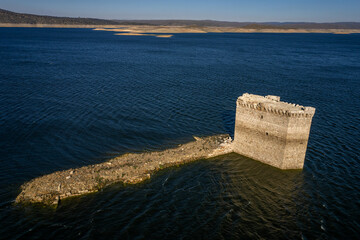 Torre de Floripes, castle located in the Alcantara reservoir. Extremadura. Spain.