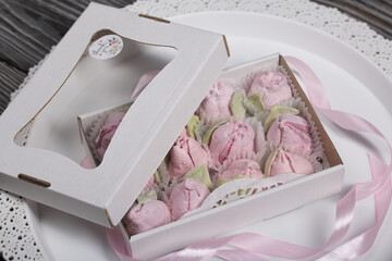 Homemade marshmallow in a gift box. Tied with a ribbon tied to a bow.