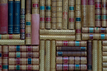 old books stacked on the shelf