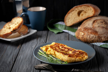 Fresh French omelet with fresh pea sprouts. Vegetarian food