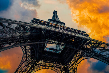 View of Eiffel Tower on sunset sky background