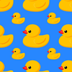 Seamless cute pattern. Yellow rubber duck on a blue background. Fashion textiles and decorative fabrics. Vector.