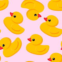 Seamless cute pattern. Yellow rubber duck on a delicate pink background. Fashion textiles and decorative fabrics. Vector.